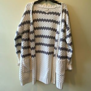 White and grey cardigan sweater